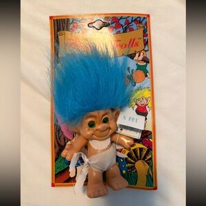 Vintage Troll with Bright Blue Hair on card 1990s